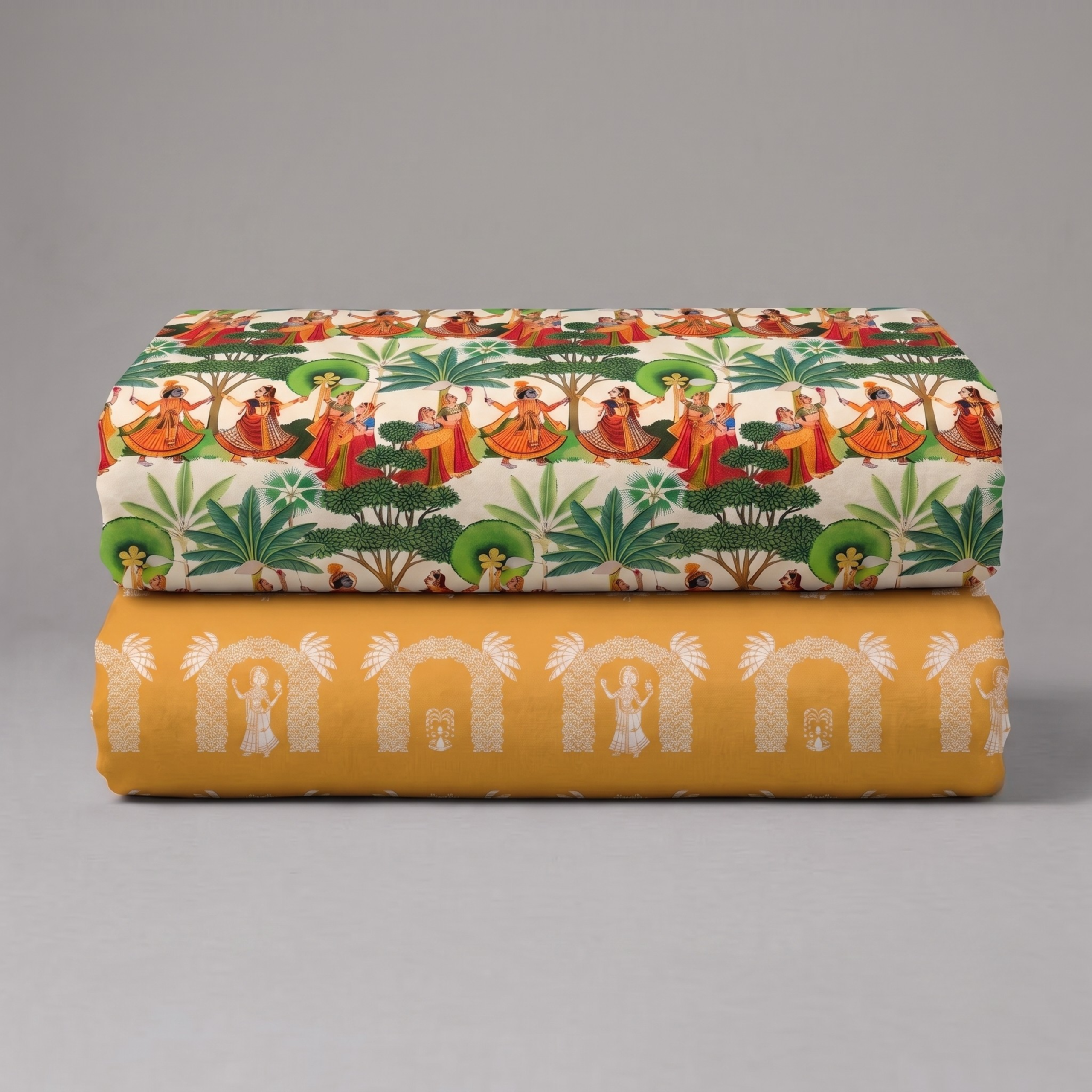 Two-piece Thakorji shringar fabric combo with pichwai print figures, trees, and temple arch motifs in folded vastra set