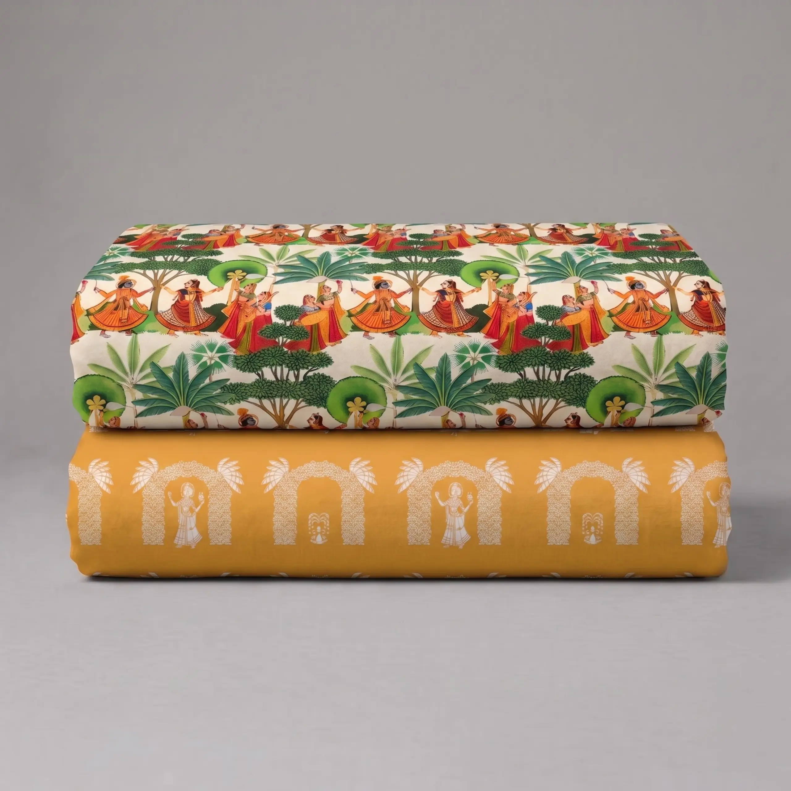 Two-piece Thakorji shringar fabric combo with pichwai print figures, trees, and temple arch motifs in folded vastra set