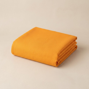 Kesari check-textured doriya malmal kapda for festive tailoring