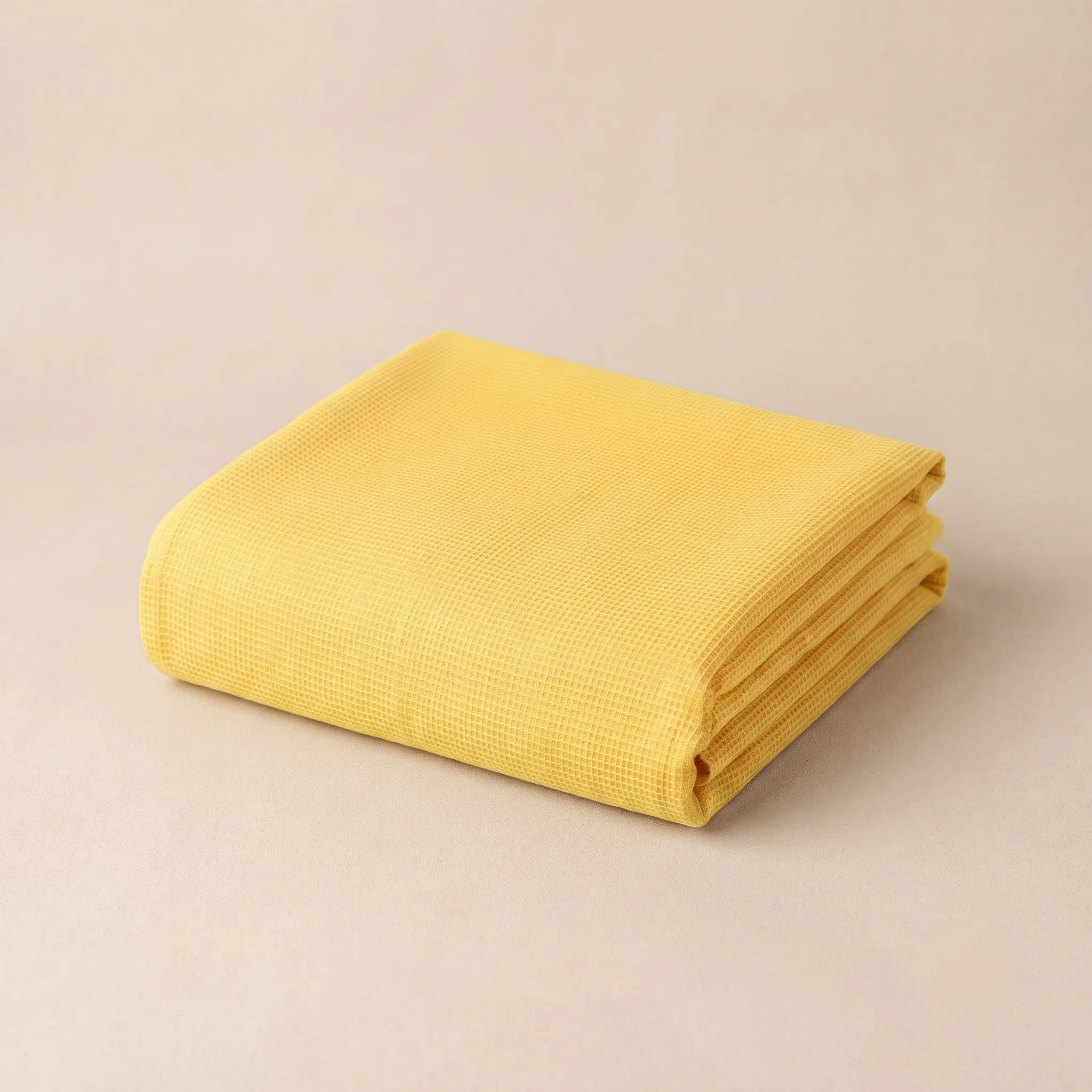 Fine weave yellow doriya malmal kapda for festive Vastra tailoring